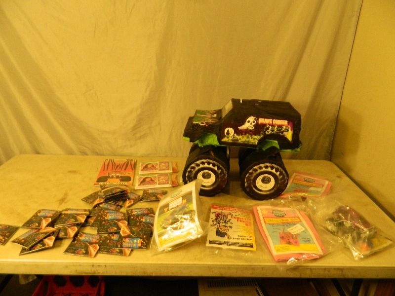 lot 182 image: Grave Digger Pinata, Party Supplies, and More