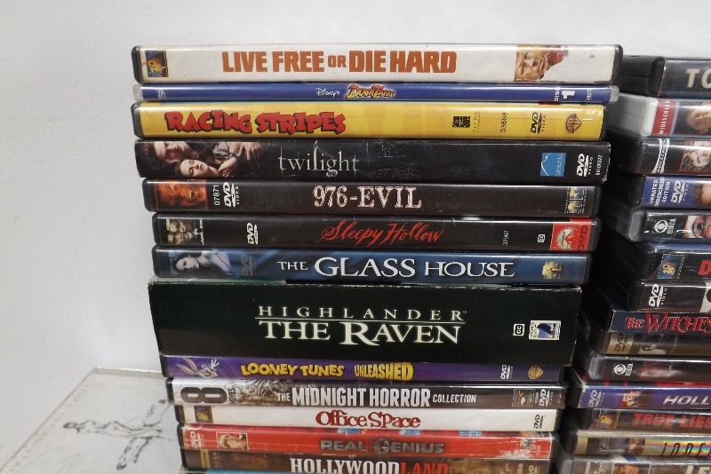 lot 35 image: 100 Popular Title DVDs and CDs