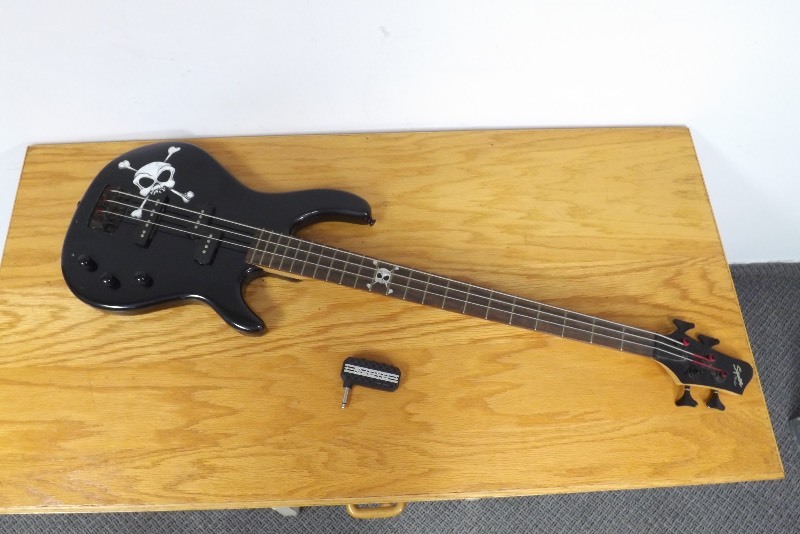 lot 36 image: Fender Squire SKULL Bass Guitar and JOYO Pocket Amplifier