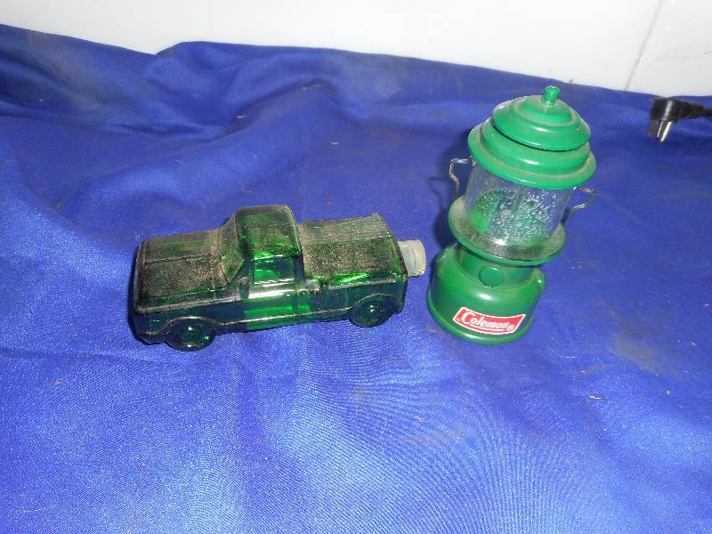 lot 30 image: 2 COLLECTIBLE AVON BOTTLES