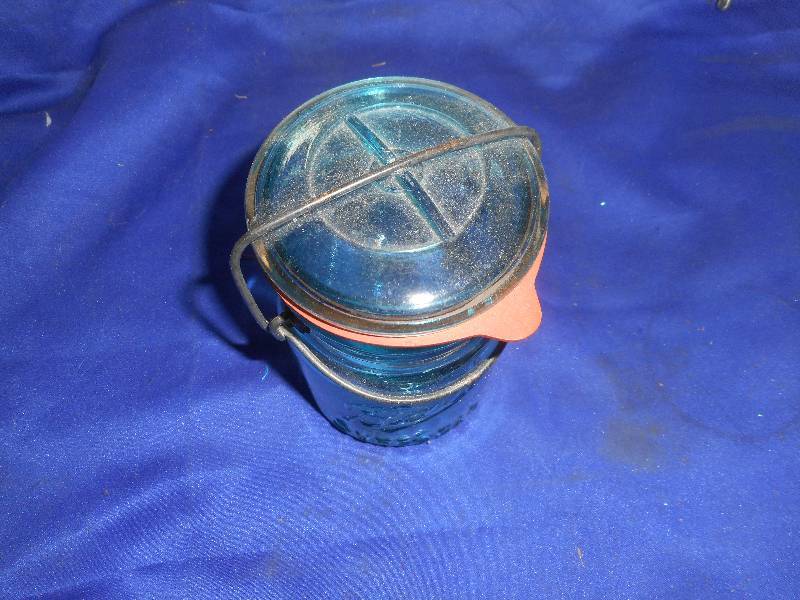 lot 41 image: ANTIQUE GREEN PINT JAR WITH GLASS COVER