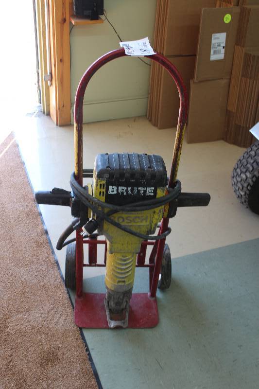 lot 18 image: Bosch Brute Breaker 60# Class Hammer w Chisel, Straight-point & Cart