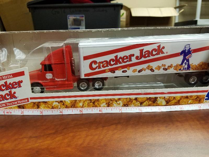lot 35 image: Cracker Jack 164 White GMC tractor Trailer