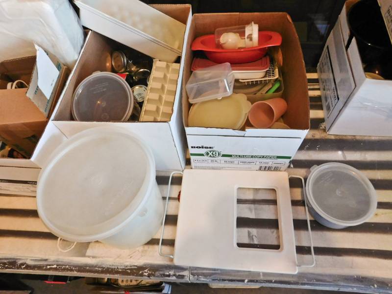 2 boxes of tupperware and kitchen items