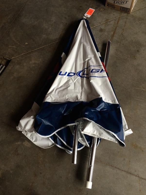 lot 62 image: Twins  Bud Light Umbrella  with poles   New, Never Used