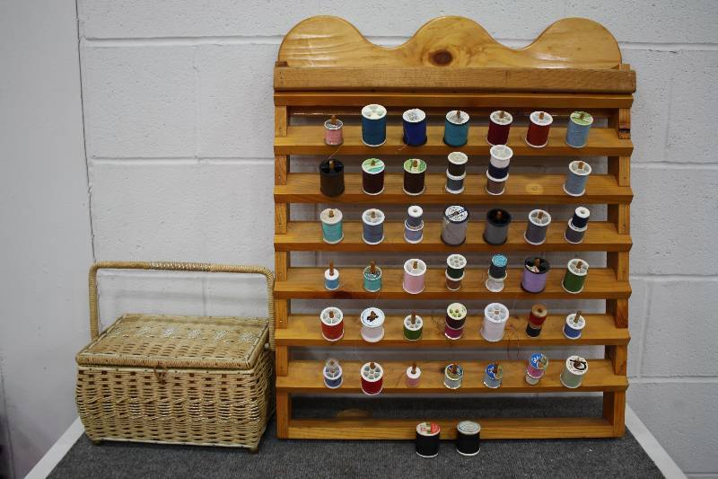 lot 133 image: Sewing basket and rack.