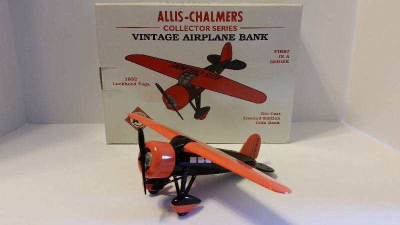 lot 13S image: 1992 SpecCast Allis Chalmers 1932 Lockheed Vega Collectors Series Vintage Airplane Coin Bank