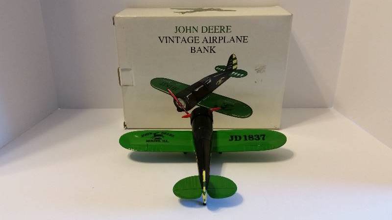 lot 15U image: SpecCast John Deere Travel Air Model R Vintage Airplane Coin Bank