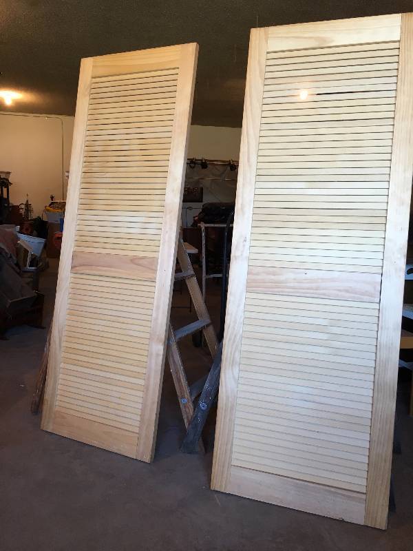 Two Hardwood Louvered Panels