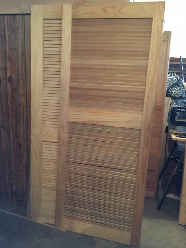 Two Hardwood Louvered Panels