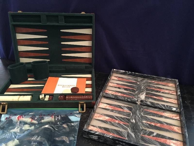 Two Backgammon Games, One is Solid Marble