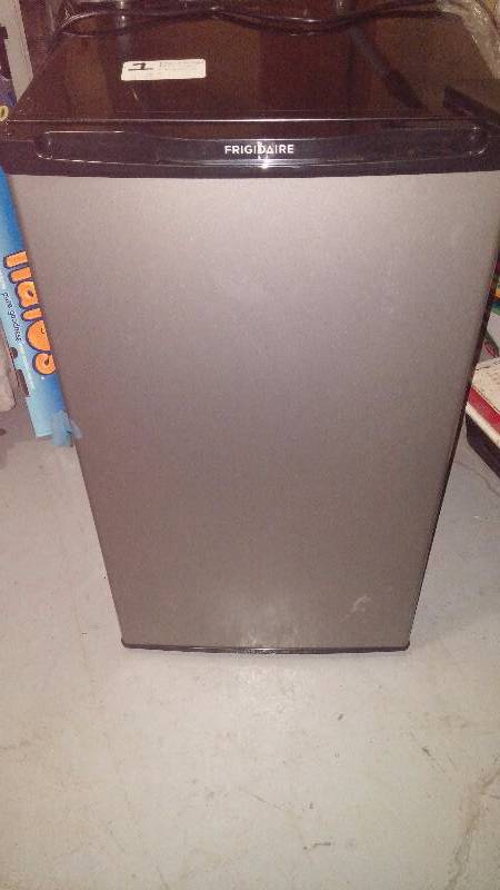 New - Damaged Frigidaire Refrigerator