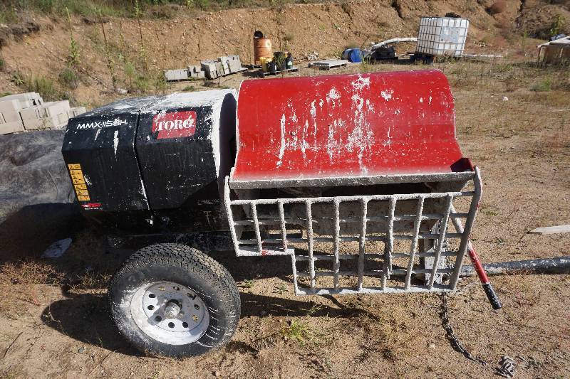 lot 2 image: Stone Toro Model MMX1158H Single Axle Pull Behind Barrel Cement Mixer