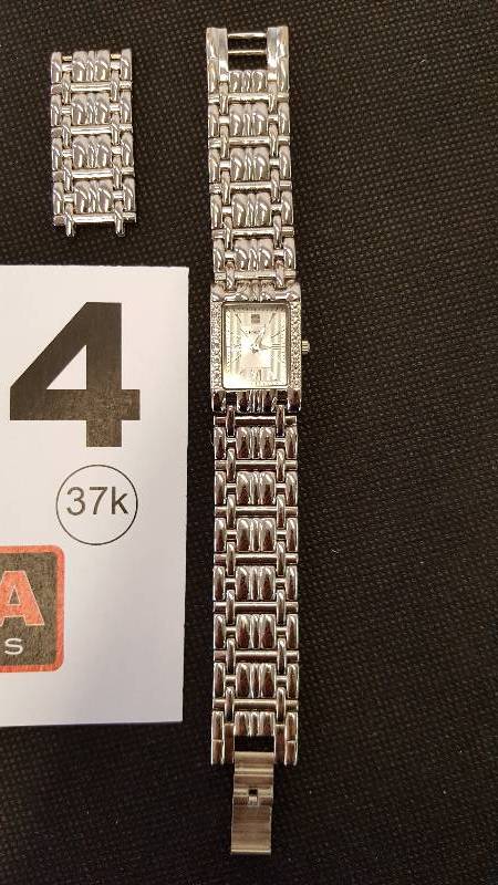lot 124 image: Geneve Ladies Silver Tone Diamond Watch