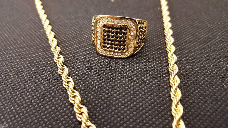 lot 97 image: Stainless Steel Mens Goldtone Cross & Ring Set