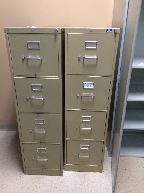 2 HON Heavy Duty 4 Drawer Filing Cabinets - Super Condition - 1 filing Cabinet has rust on top