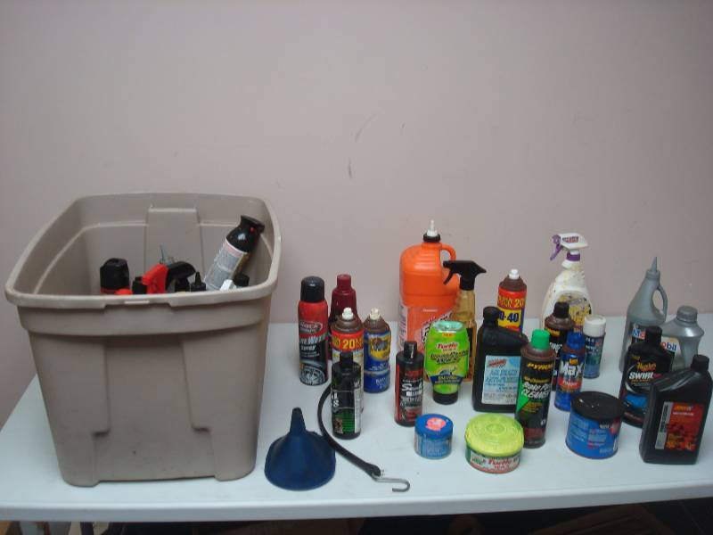Bin Filled With Cleaning And Car Liquids, Oil