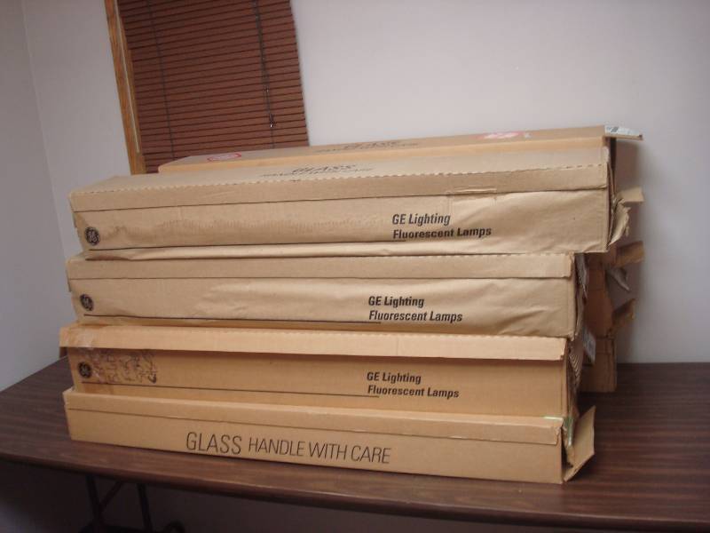 Stack Of Unused Flourescent Light Bulbs, Different Sizes