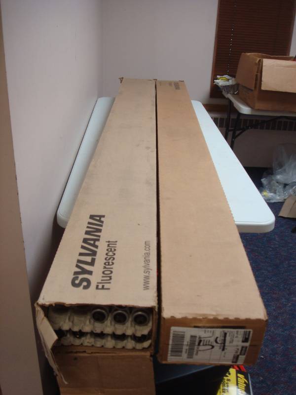Two Boxes Of Long Flourescent Light Bulbs