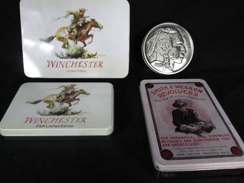 lot 35 image: Winchester & Smith & Wesson Collector Tins