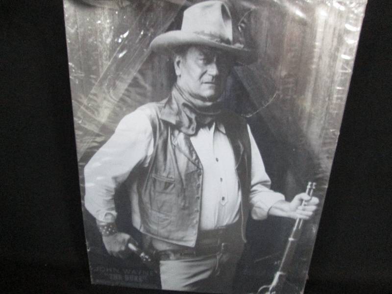 lot 55 image: John Wayne Tin Sign the Duke