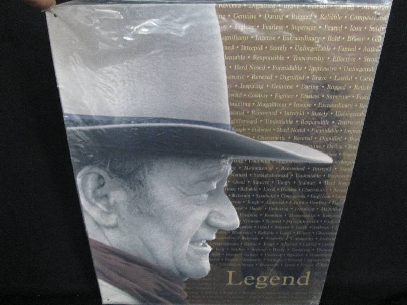 lot 57 image: John Wayne Tin Sign Legend