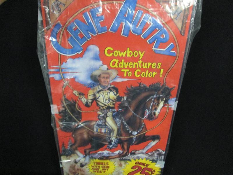 lot 62 image: Collectible Embossed Tin Sign Gene Autry