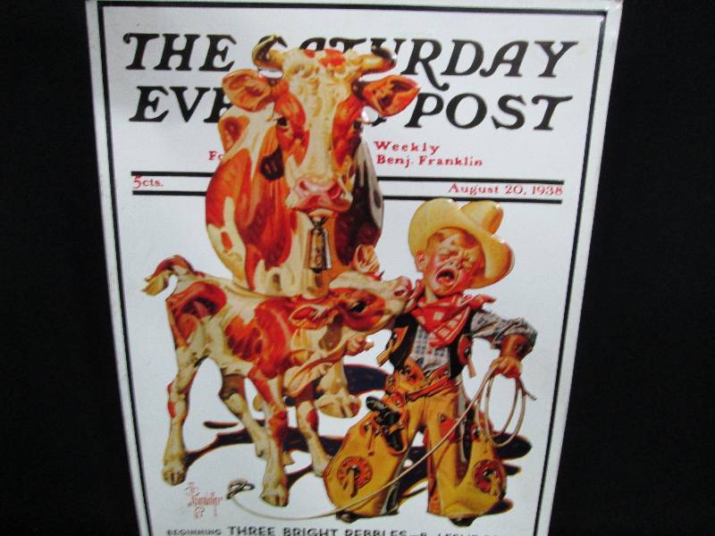 lot 64 image: Collectable Embossed Tin Sign Cowboy