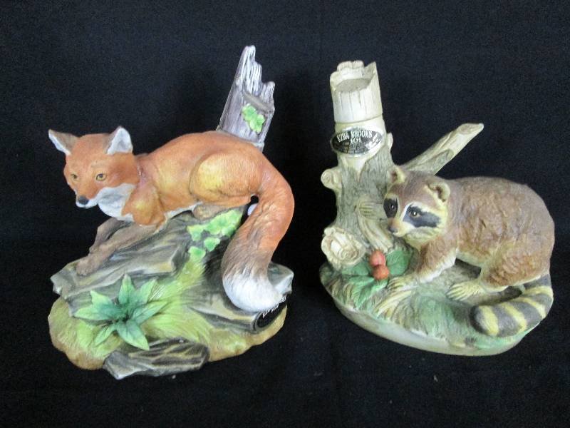 lot 79 image: Ezra Brooks Raccoon & Fox  Decanters