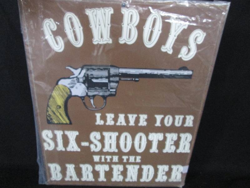 lot 102 image: Collectible Tin Sign Cowboy Six Shooter