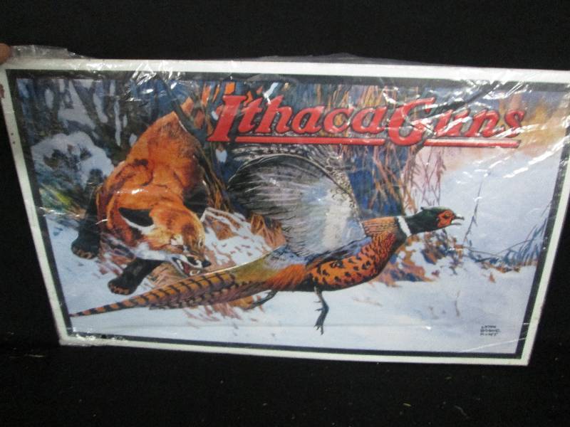 lot 138 image: Collectable Embossed Tin Sign Ithaca Guns