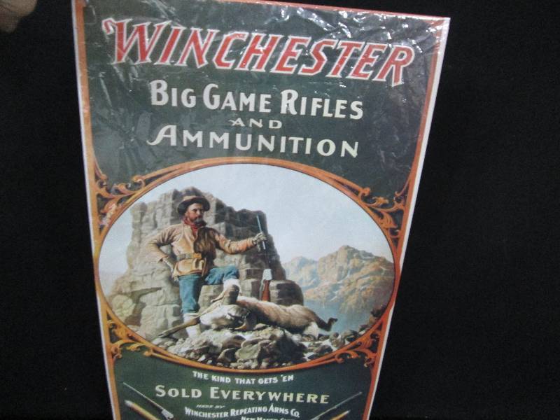 lot 147 image: Collectable Embossed Tin Sign Winchester Big Game Rifles & Ammunition