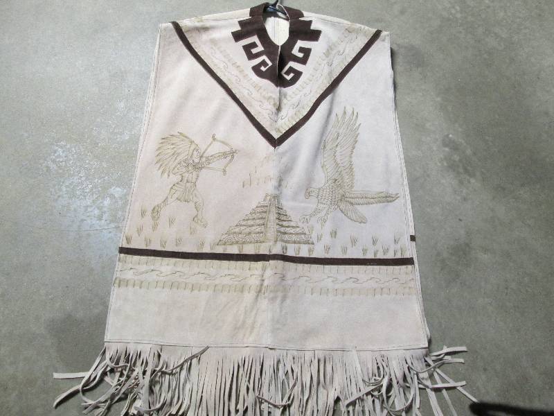 lot 179 image: Suede Lather Poncho