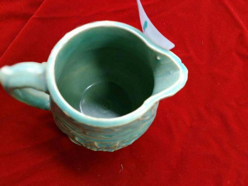 lot 15 image: McCoy Pottery Pitcher
