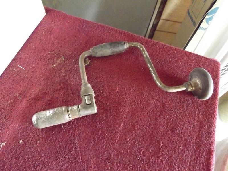 lot 48 image: Hand drill, metric sockets, tie dow...