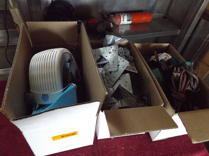 lot 55 image: Metal wood bracing, extension cords...