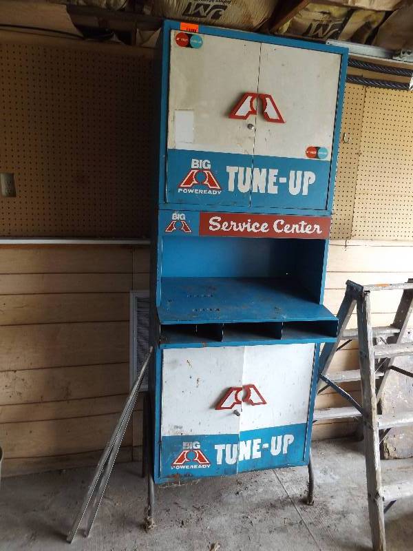 lot 61 image: Metal Big A Tune Up Center,