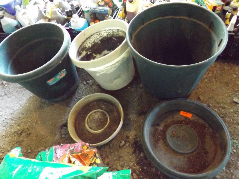 lot 140 image: Large green plastic planters with b...