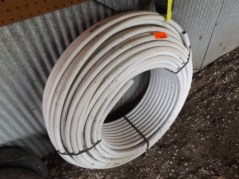 lot 155 image: Roll of pex hose...