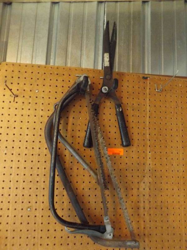 lot 183 image: Clippers, 3 hand saws...