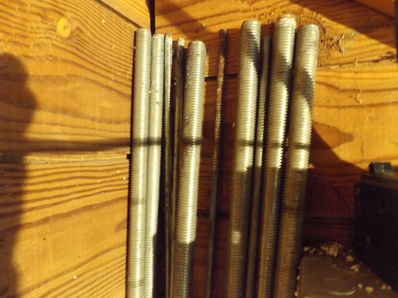 lot 245 image: Threaded metal rods, approx 10 larg...