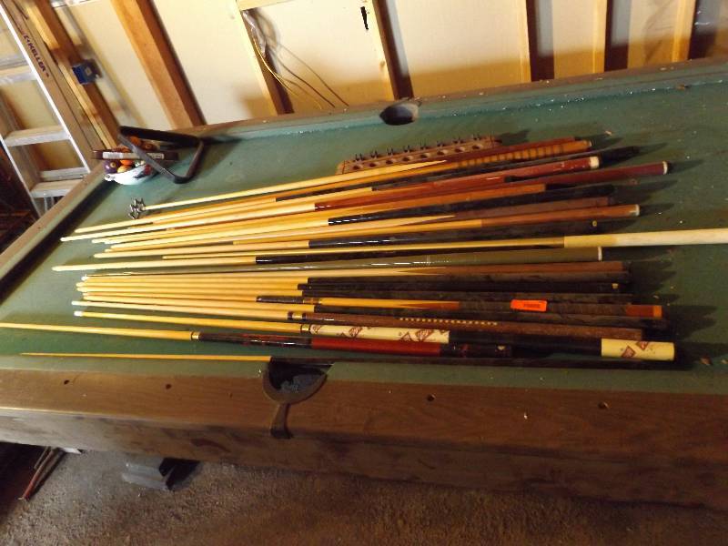 lot 266 image: Approx 25 pool cues, some new, pool...