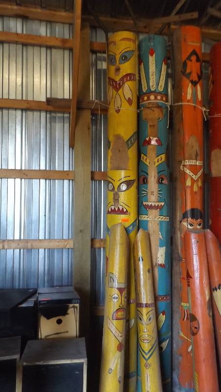 lot 342 image: Three totem poles from Westward Ho...