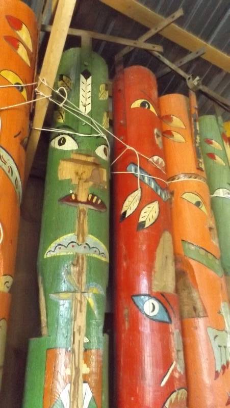 lot 348 image: Three totem poles from Westward Ho...