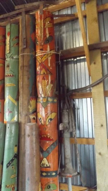 lot 351 image: Three totem poles from Westward Ho...