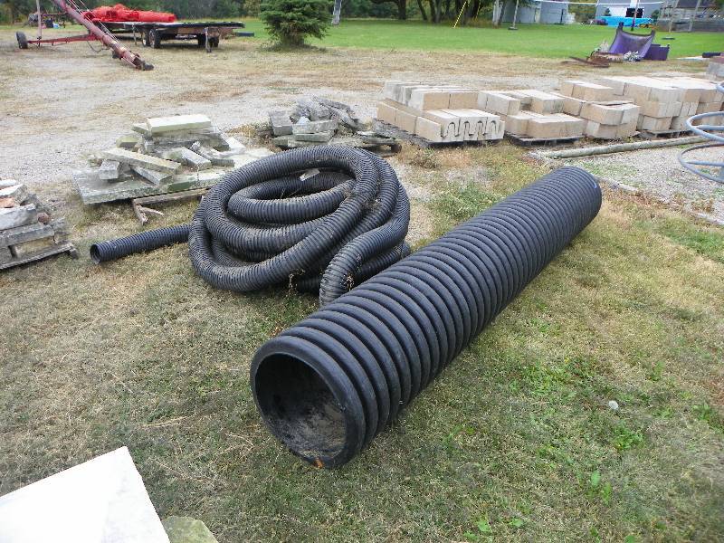 lot 209 image: 4 x 100 feet of perforated tubing,...