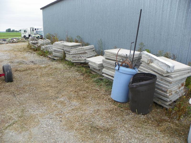 lot 210 image: Concrete sidewalk slabs, some grate...