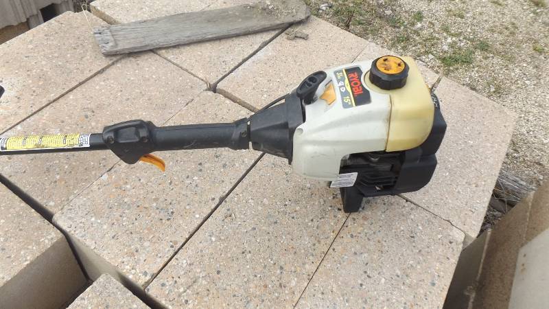 lot 151 image: Ryobi weed eater...