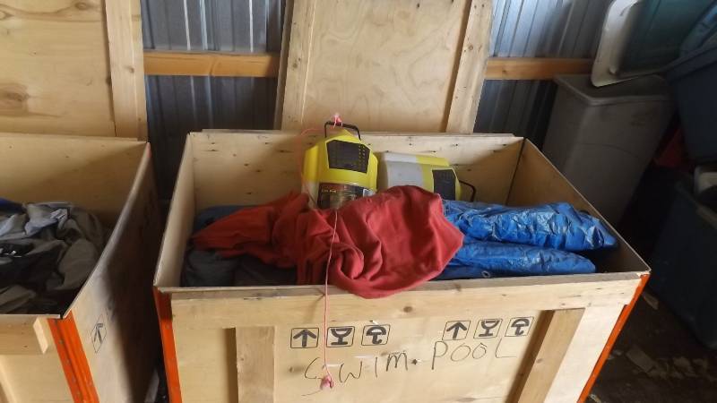lot 390 image: Crate of plastic and tarps, 2 fish ...