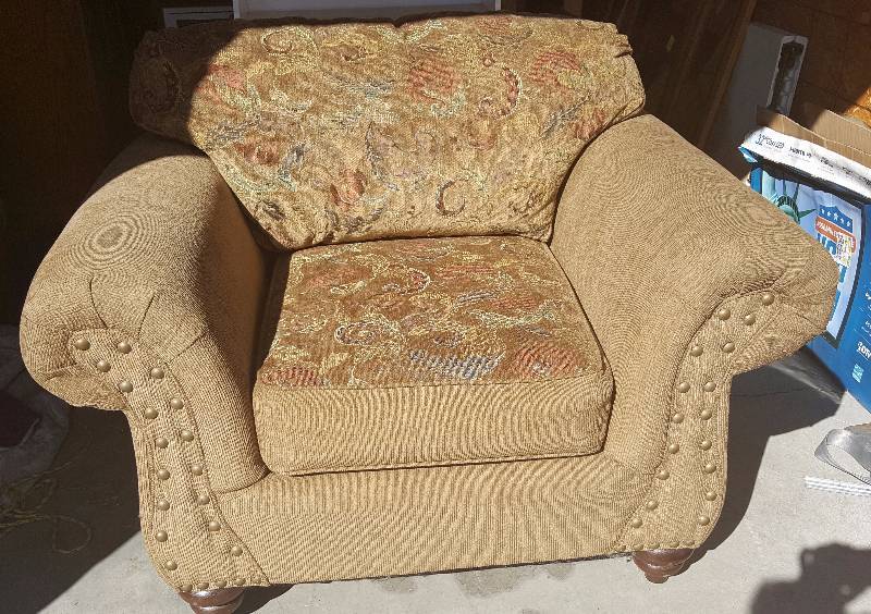 lot 2 image: Tan cushion living room chair